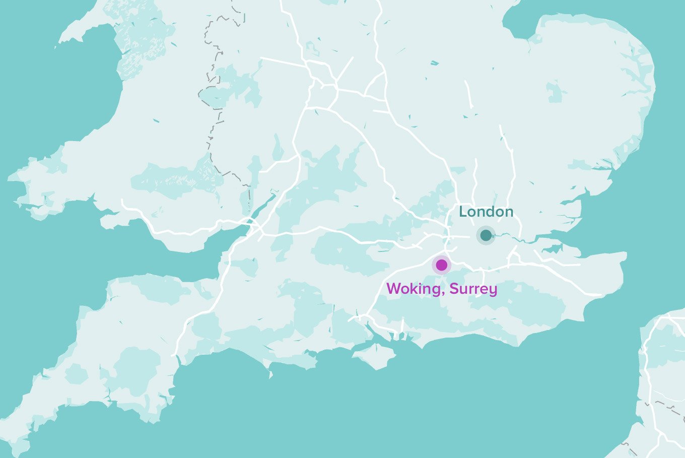 A map of southern United Kingdom with a pin locating Woking